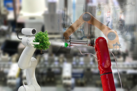 Robot plant a tree environmental Industrial tree in the arm futureの写真素材