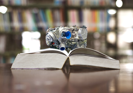 education knowledge engine parts concept on the bookの写真素材
