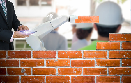 Smart robot industry 4.0 arm brick building construction human force remote wifiの写真素材