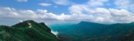 Panorama views valley mountain and sky rainy seasonの写真素材