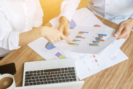 Business team work analyzing charts and graphs strategy concept modern laptop computerの写真素材