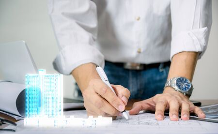 Engineer for the design of the sheet plan display technology building modelの写真素材