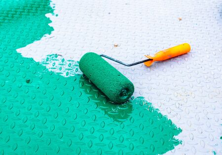 Painted with a roller on the steel floorの写真素材