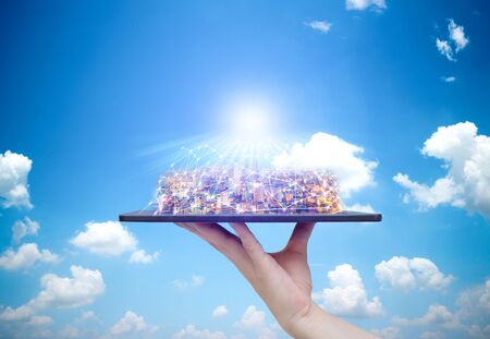 Tablet communication technology in the handの写真素材