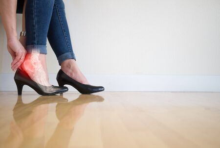 Women wearing high heels Human leg ankle inflammation Of boneの写真素材
