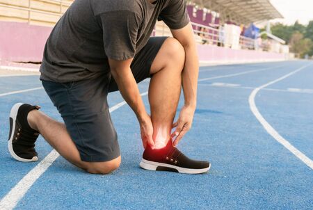Runners to exercise ankle joint bone Inflamed の写真素材