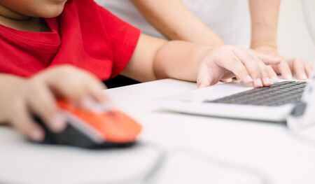 Adults teach children use computer the education