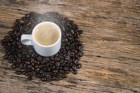 Coffee machine extraction into a coffee cupの写真素材