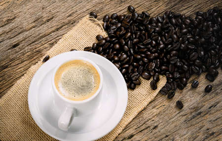 Coffee machine extraction into a coffee cupの写真素材