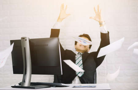 Happy business men throw documents Successful jobの写真素材