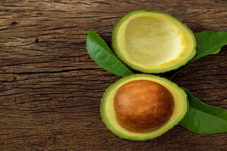Avocado on a brown wooden floor