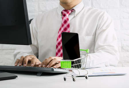 Business people check E-Commerce Online market and salesの写真素材