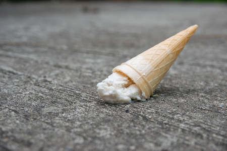 Ice cream falls on the floorの写真素材