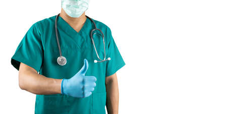 Surgical doctor with a thumbs up healthcare workers concept on a white backgroundの写真素材