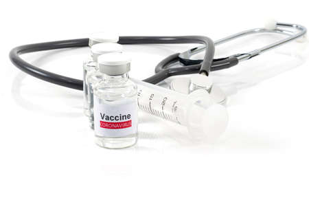 Vaccine coronavirus bottle and medical Syringe on a white backgroundの写真素材