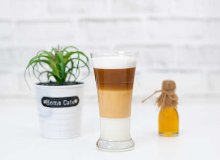 Coffee latte milk froth the hot drinkの写真素材