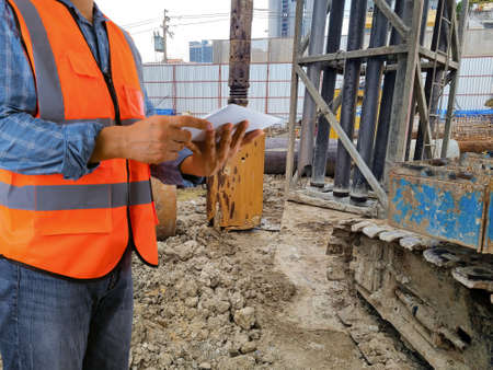 construction control engineer Cranes on the construction site area industry machine of drilling pilesの写真素材