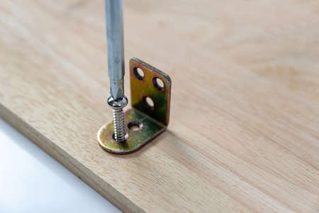Screwdrivers and screws for drilling woodの写真素材