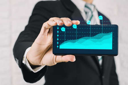 A business man concept of doing business with Smartphone technology and innovationの写真素材