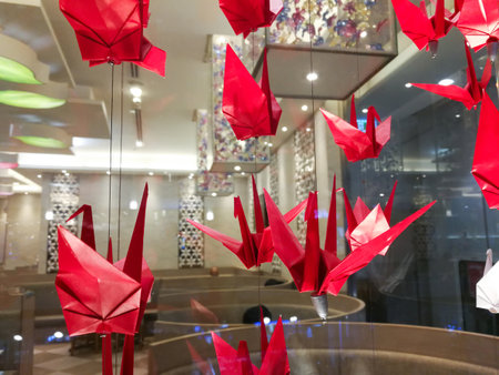 red paper a bird or the manyの写真素材