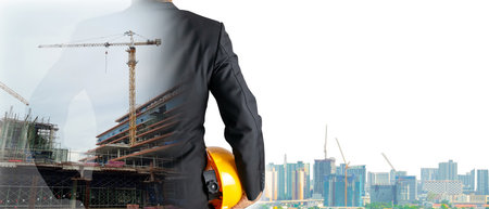 Double Exposure Building Construction Engineering Project Concept Graphic designers, architects or construction workers with modern technology and equipment.の写真素材