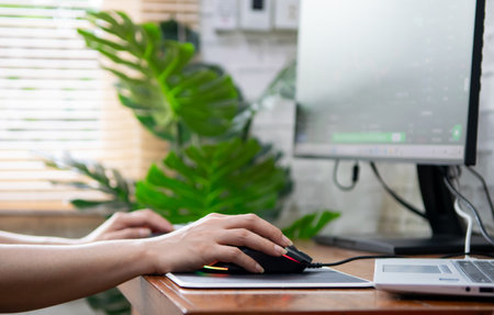 Woman analyzing graphs in progress money on the table doing work