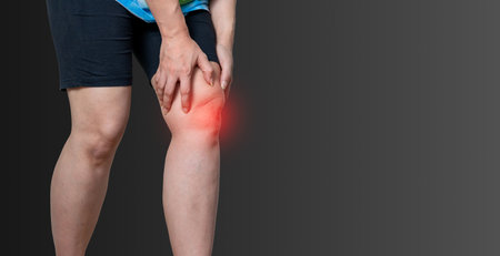knee osteoarthritis Joint pain arthritis and ligaments on a black backgroundの写真素材
