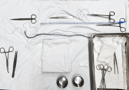 Set of surgical instruments on a hospital tableの写真素材