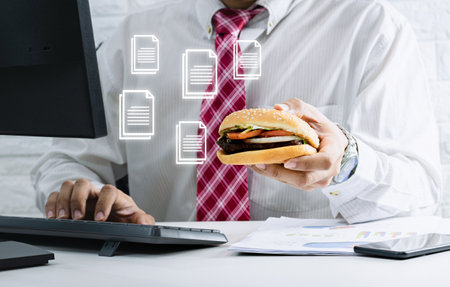 Business developer using document on laptop computer project management conceptの写真素材