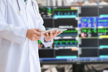 Doctor concept and medical stethoscope holding a tabletの写真素材