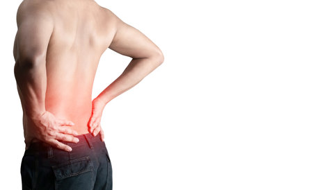 Man has pain and inflammation on his back, white backgroundの写真素材