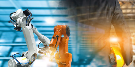 Manufacturing industry by robots, artificial intelligence and engineersの写真素材