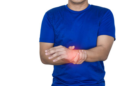 Man has wrist pain, inflammation of the bones and tendonsの写真素材