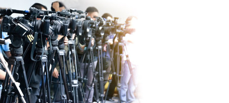 Many reporters and video cameras, white background.