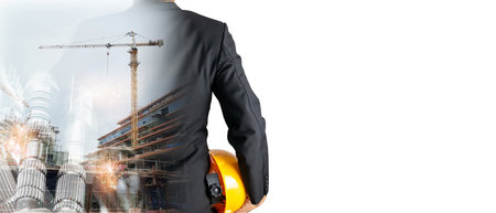Double Exposure Building Construction Engineering Project machinery Concept Graphic designers, architects or construction workers with modern technology and equipment.の写真素材