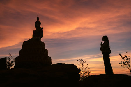 Buddhism, Buddha statues, worship and the morning sunlightの写真素材