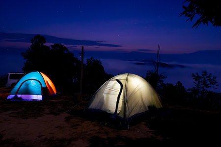 Night camping in mountain Tents, Travel and Relaxationの写真素材