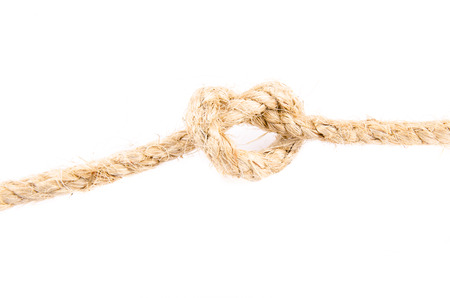 ship rope with a knot isolated on white backgroundの写真素材