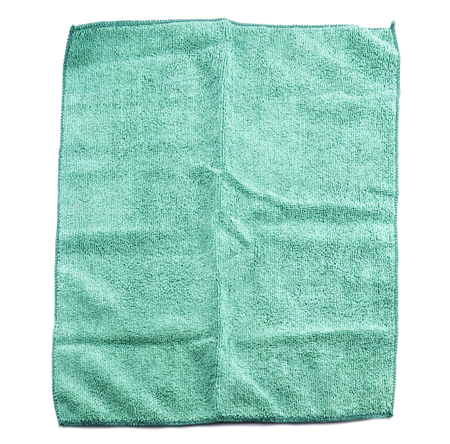 Crumpled green microfiber cloth isolated on white background