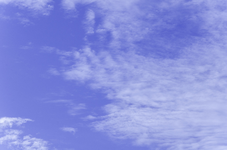 blue sky background with tiny cloudsの写真素材
