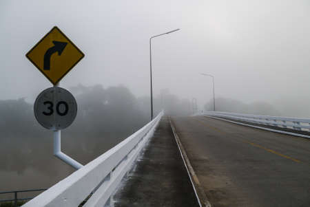 Fog on bridge in cold day of  morning timeの写真素材