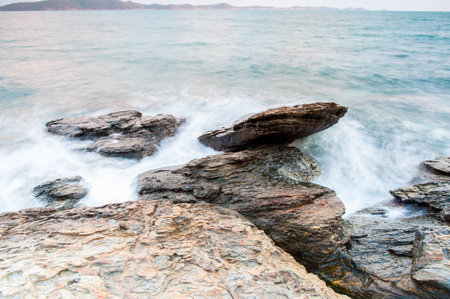 sea stones at during rain khao laem ya national park rayong province thailandの写真素材