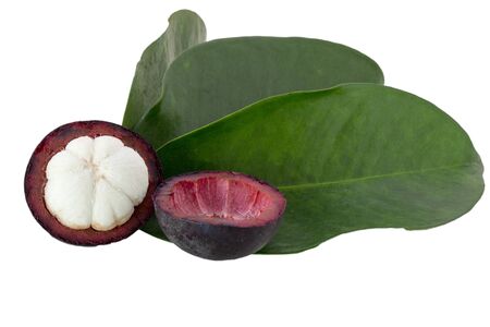 Ripe mangosteens (Garcinia mangostana) half mangosteen with green leaves isolated on the white backgroundの写真素材