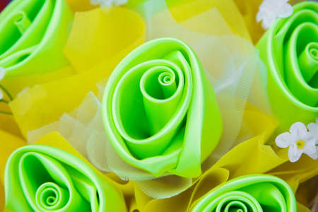 Floral background. Lot of artificial flowers in colorful composition,closeup flowers backgroundの写真素材