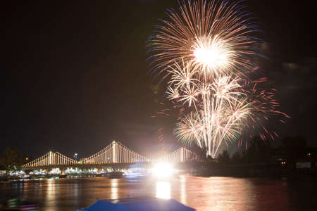 SURATTHANI, THAILAND - OCTOBER 17 : Beautiful firework display for celebration on the Tapee river on parades in Chak Phra Festival on October 17, 2015 in Suratthani, Thailand.の写真素材