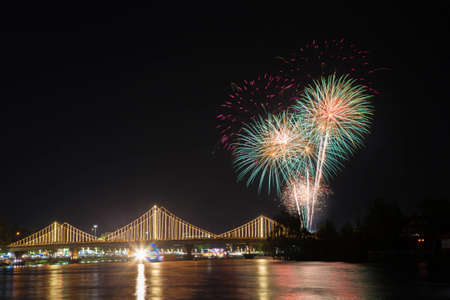 SURATTHANI, THAILAND - OCTOBER 17 : Beautiful firework display for celebration on the Tapee river on parades in Chak Phra Festival on October 17, 2015 in Suratthani, Thailand.の写真素材