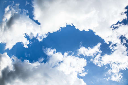 cloud against the blue sky,Beautiful sky with fluffy cloudsの写真素材