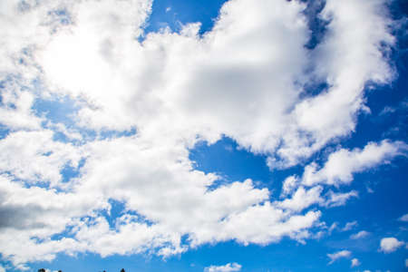 cloud against the blue sky,Beautiful sky with fluffy cloudsの写真素材