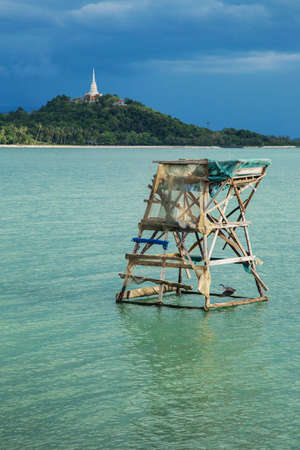 Fishing carrelets and the town of Saint Nazaire in the background, at Saint-Michel-Chef-Chef in the Loire-Atlantique department in western France.の写真素材