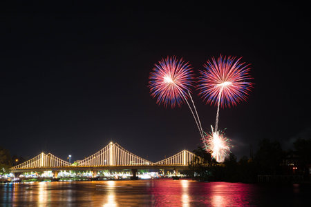 SURATTHANI, THAILAND - OCTOBER 17 : Beautiful firework display for celebration on the Tapee river on...
